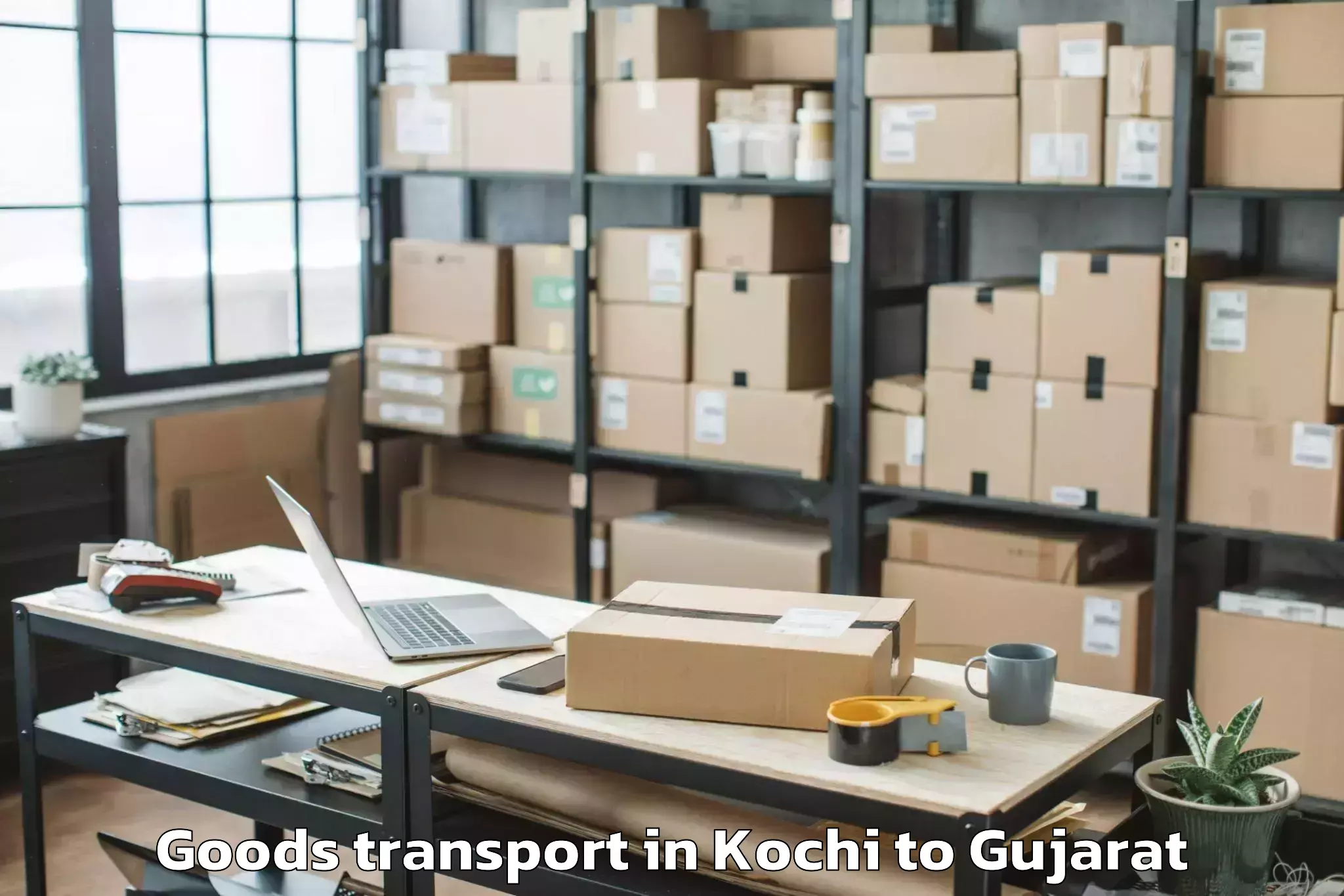 Top Kochi to Keshod Goods Transport Available